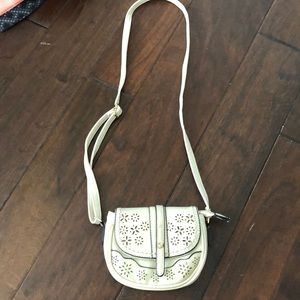 White purse with flower design